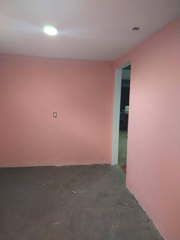 picture of a recently painted home after having drywall installed